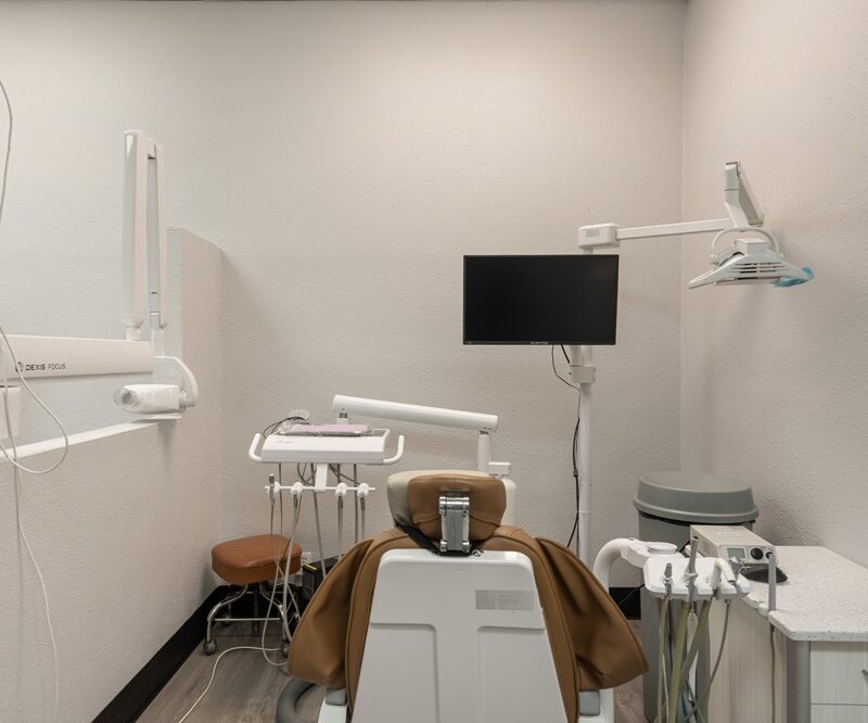 Empty dental treatment room with x-ray equipment at Santa Martha Dental in Ontario, CA